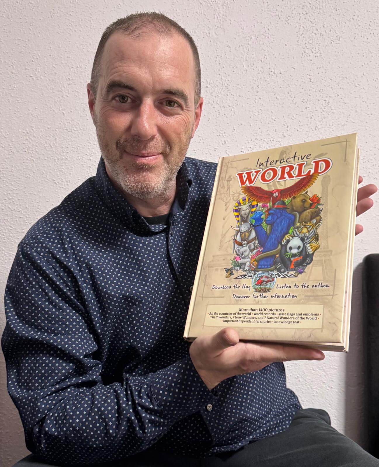 author with a book in his hands